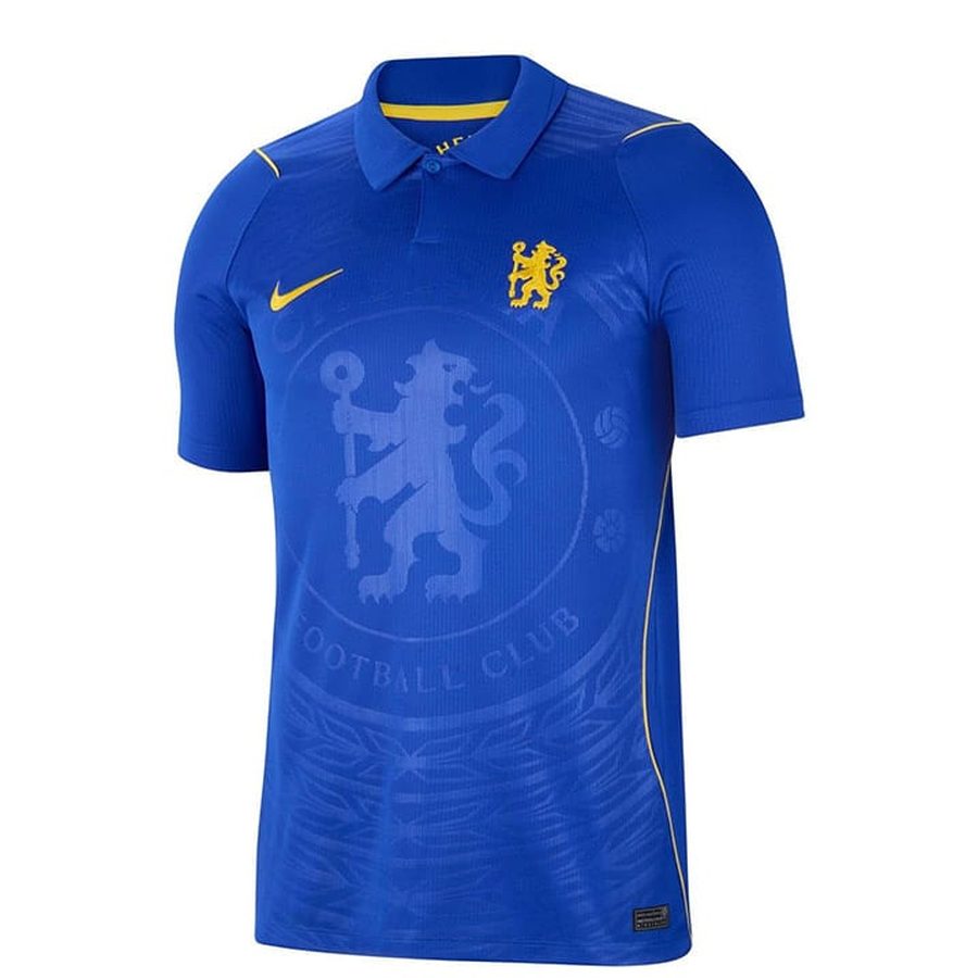 Chelsea home jersey in royal blue with a gold lion crest and a collared neck.