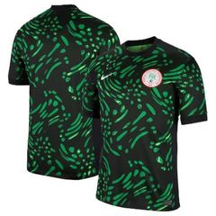 Nigeria 2025 home jersey in black with a scattered green leaf print and the Nigeria Football Federation crest.
