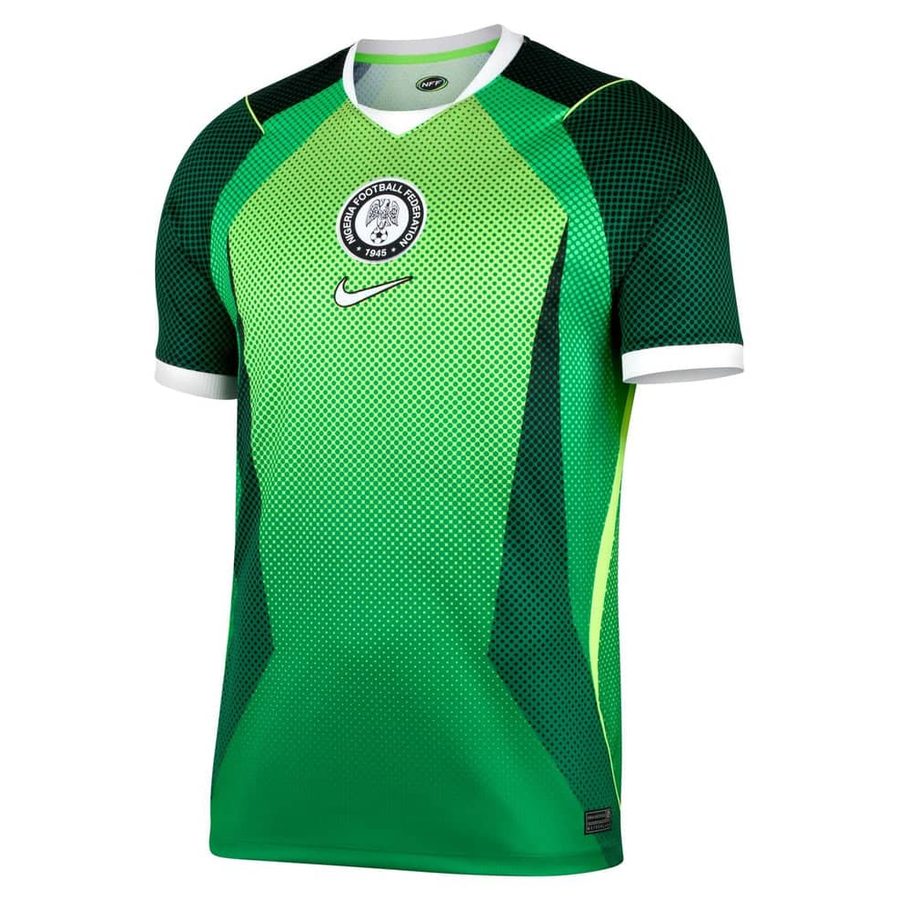 Nigeria Super Eagles 2026 home jersey in bright green with a dotted fade pattern and the Nigeria Football Federation crest.
